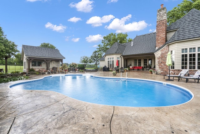 view of pool with a patio