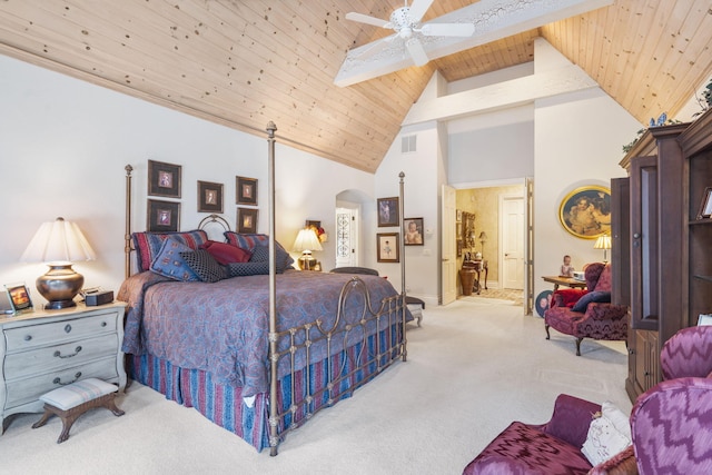 bedroom with ceiling fan, wooden ceiling, light colored carpet, beam ceiling, and high vaulted ceiling