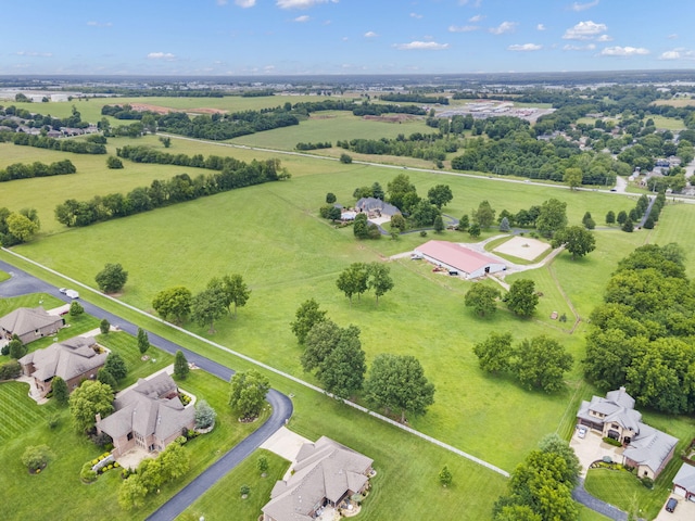 birds eye view of property featuring a rural view