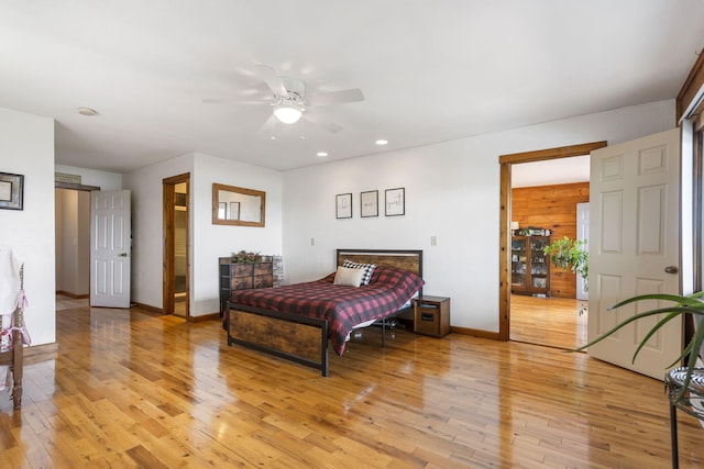 bedroom featuring ceiling fan and light hardwood / wood-style floors