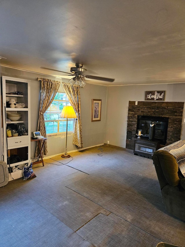 carpeted living room with ceiling fan