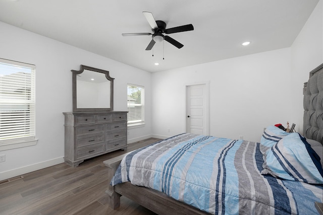 bedroom featuring ceiling fan and hardwood / wood-style floors