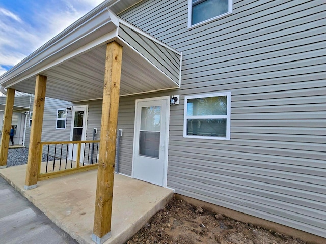 doorway to property with a patio area