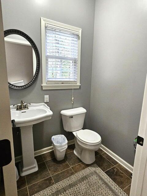 bathroom featuring toilet