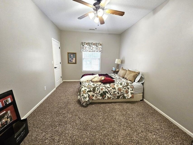 bedroom with ceiling fan and carpet flooring