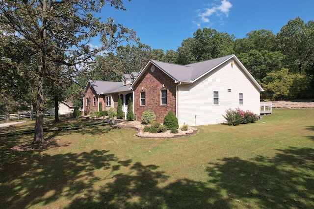 view of home's exterior featuring a lawn