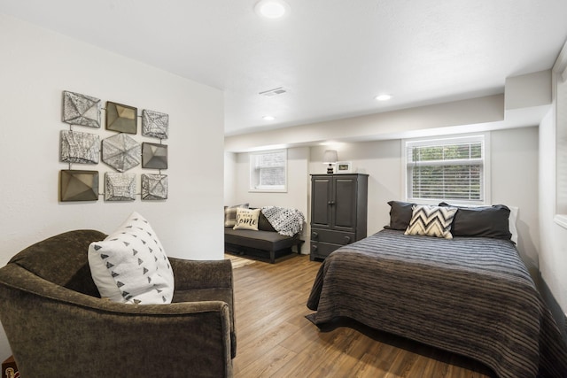 bedroom with light wood-type flooring