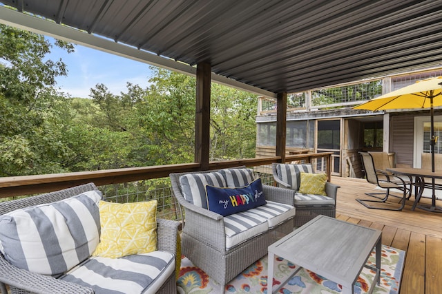 wooden deck with an outdoor hangout area