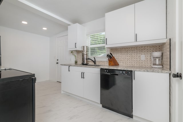 kitchen with black appliances, sink, backsplash, light stone countertops, and white cabinetry