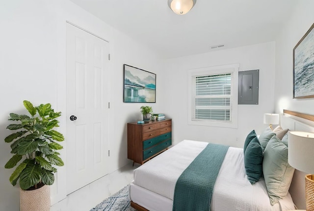 bedroom featuring electric panel