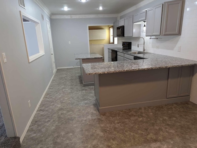 kitchen featuring dark carpet, sink, gray cabinetry, black appliances, and light stone countertops