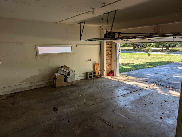 garage featuring a garage door opener