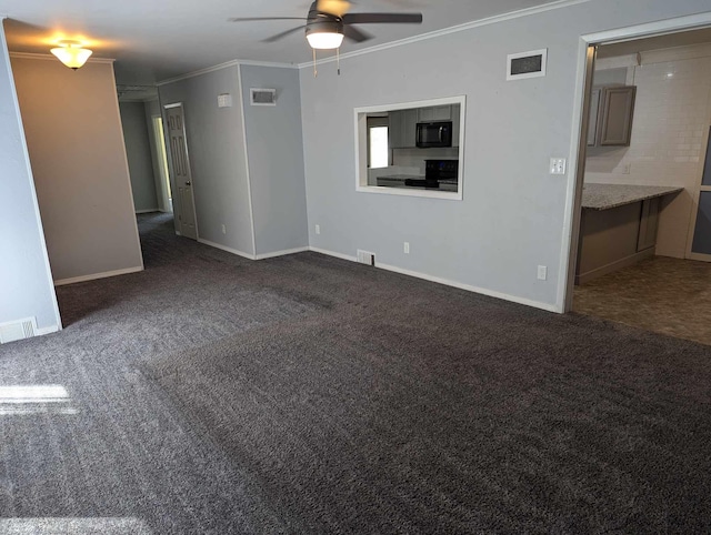 carpeted empty room featuring ornamental molding and ceiling fan