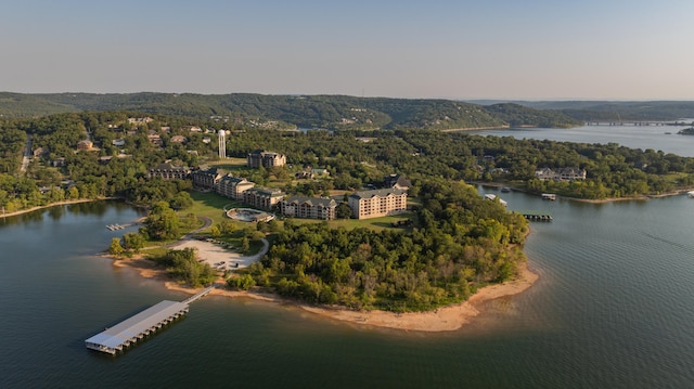 aerial view at dusk with a water view