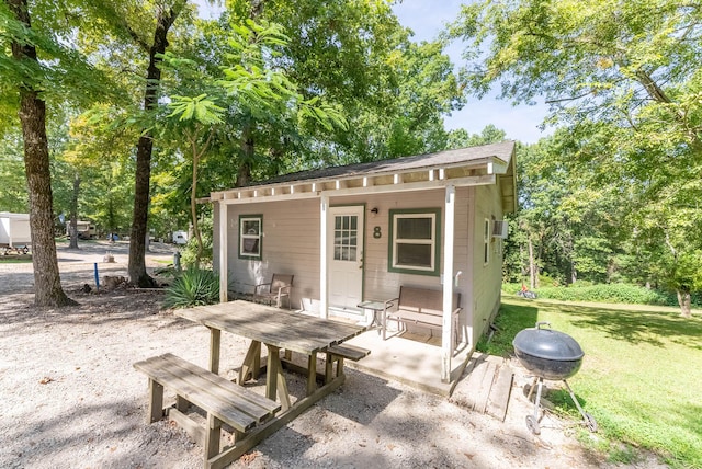 view of outdoor structure with a lawn