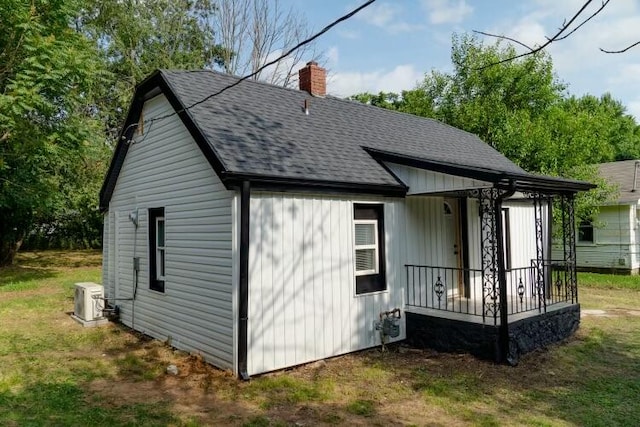 exterior space with a lawn and covered porch