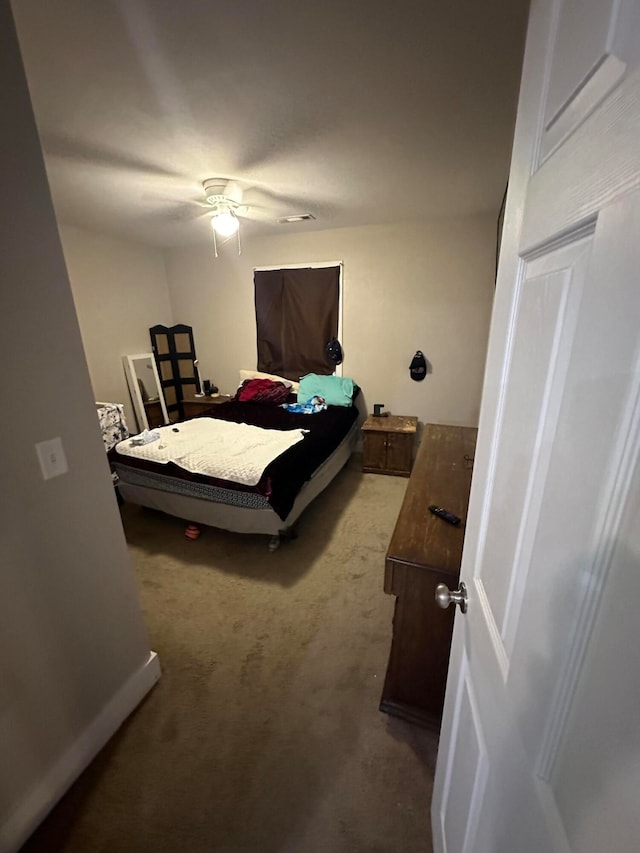 bedroom featuring carpet floors and ceiling fan