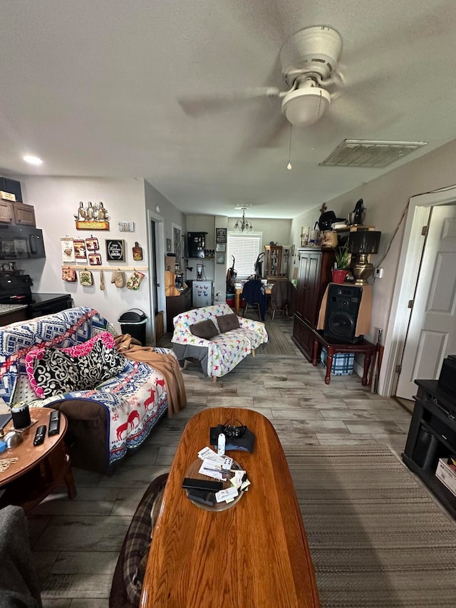 living room with ceiling fan