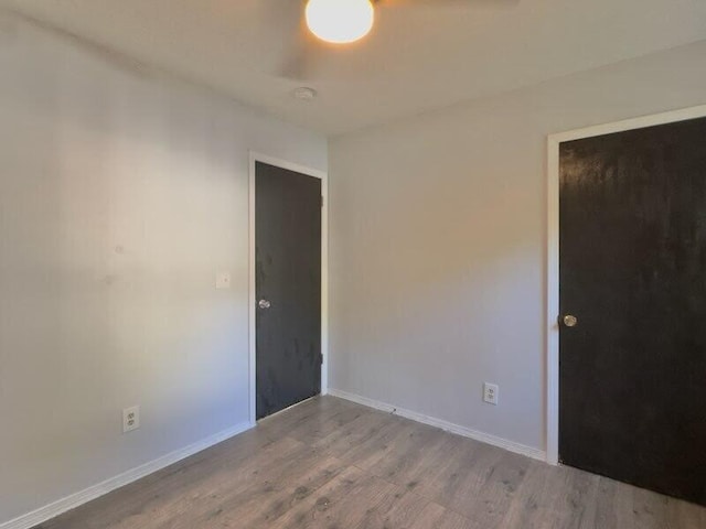 empty room featuring hardwood / wood-style floors