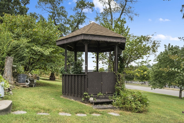 exterior space with a gazebo and a yard