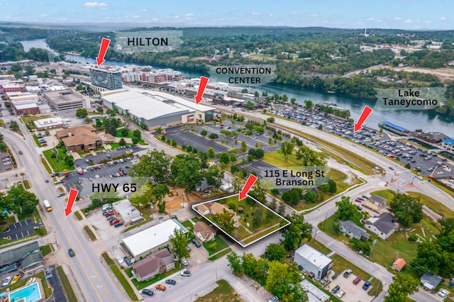 birds eye view of property featuring a water view