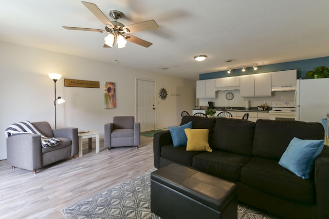22016 Waters Edge Dr, Shell Knob, MO 65747 - living area with ceiling fan and light wood finished floors