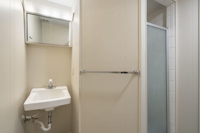 bathroom featuring sink and walk in shower