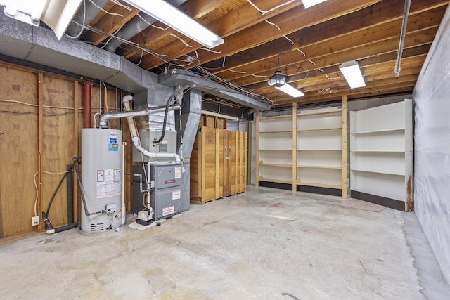 basement with heating unit and gas water heater