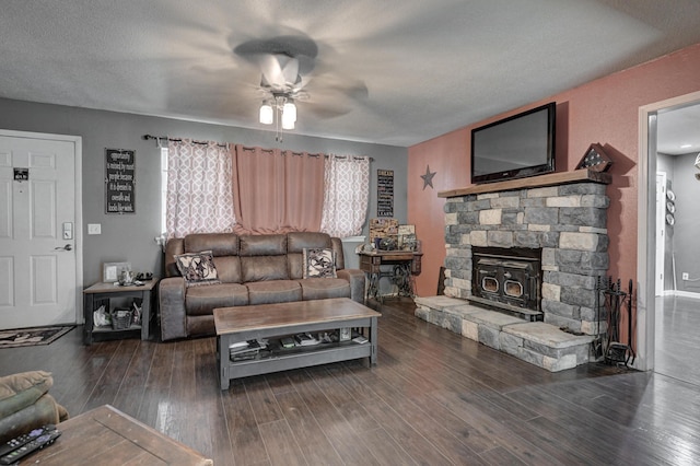 living room with a ceiling fan and wood finished floors