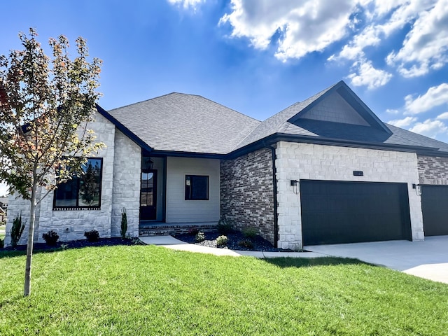 3940 E Ridgeview St, Springfield, MO 65809 - view of front of home featuring stone siding, an attached garage, a front yard, a shingled roof, and concrete driveway