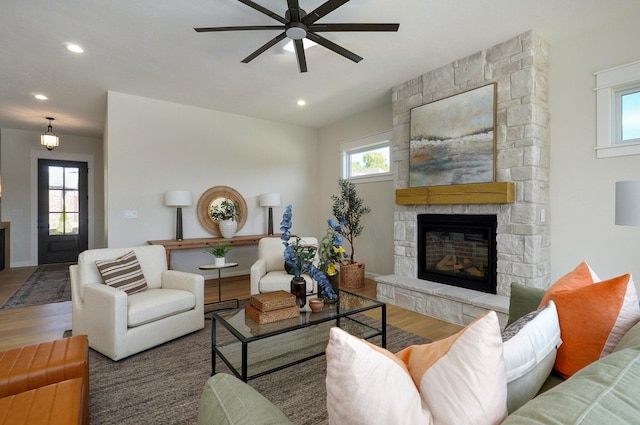 3940 E Ridgeview St, Springfield, MO 65809 - living area featuring a fireplace, wood finished floors, ceiling fan, and recessed lighting