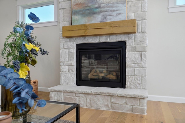 3940 E Ridgeview St, Springfield, MO 65809 - detailed view of a stone fireplace and wood finished floors