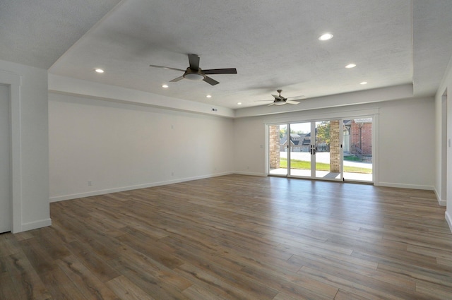 3940 E Ridgeview St, Springfield, MO 65809 - unfurnished room featuring recessed lighting, a ceiling fan, wood finished floors, and a textured ceiling