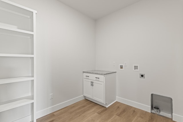 washroom featuring laundry area, hookup for an electric dryer, light wood-type flooring, baseboards, and washer hookup