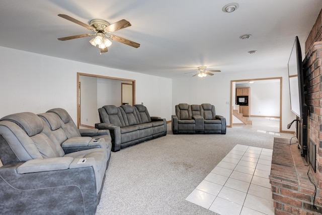 living room with light colored carpet and ceiling fan