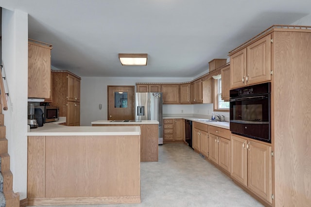 kitchen featuring black appliances, light carpet, sink, kitchen peninsula, and light brown cabinetry