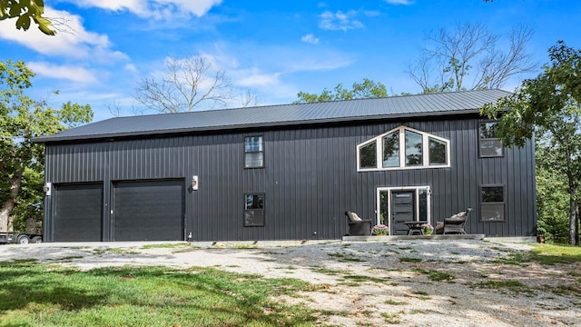 exterior space featuring wood walls