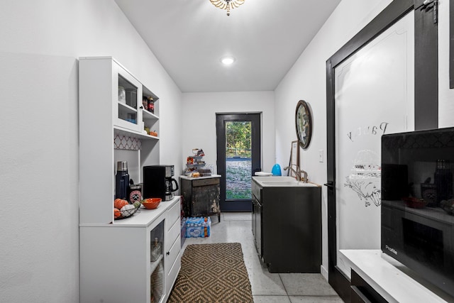 kitchen featuring white cabinets