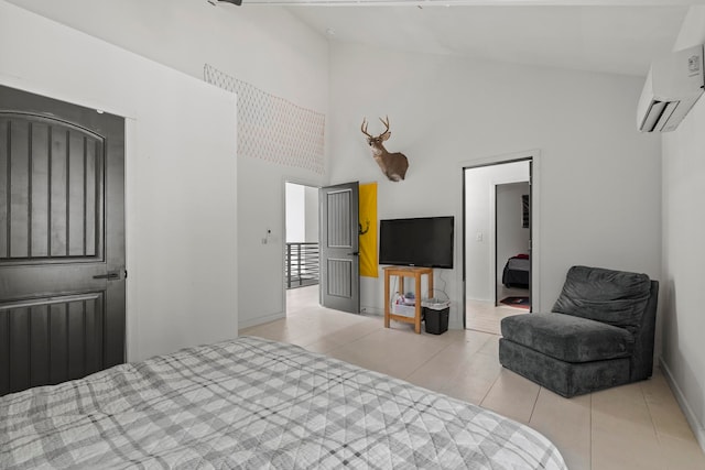 bedroom featuring high vaulted ceiling, a wall unit AC, a closet, and light tile patterned floors