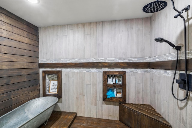 bathroom featuring a shower and wooden walls