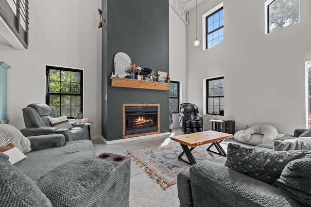 living room with a towering ceiling