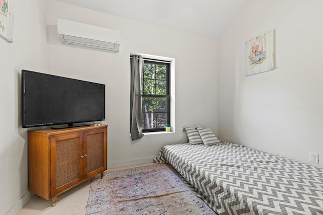 bedroom with an AC wall unit and vaulted ceiling