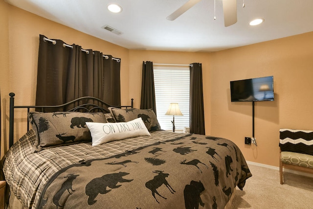 carpeted bedroom featuring ceiling fan