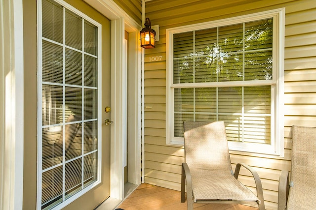 entrance to property featuring a porch