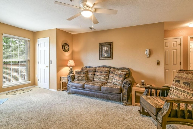 1007 Rocky Shore Ter, Kimberling City, MO 65686 - living area with baseboards, carpet flooring, a textured ceiling, and ceiling fan