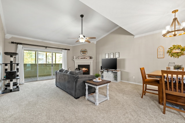 living room featuring ceiling fan with notable chandelier, light colored carpet, lofted ceiling, and crown molding