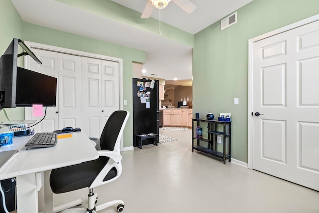 home office with concrete floors