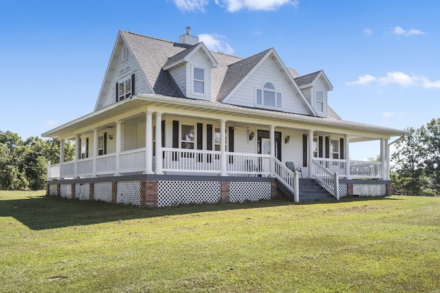 country-style home featuring a porch and a front yard