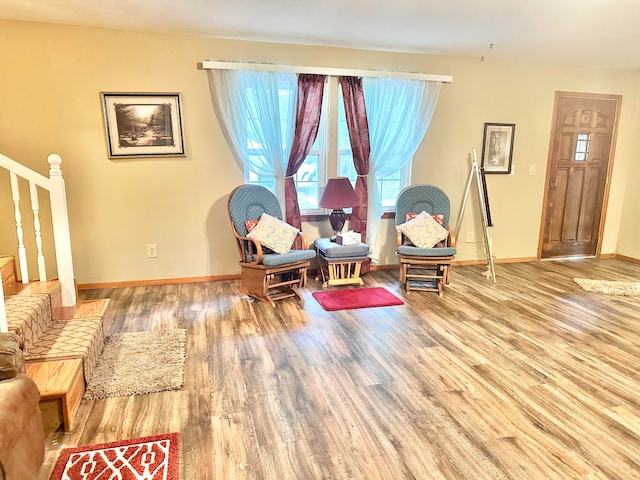 sitting room featuring hardwood / wood-style floors