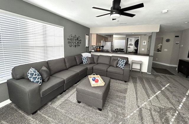 200 Meadow Ridge Ln Unit 6-2, Branson, MO 65616 - living room featuring carpet, a healthy amount of sunlight, baseboards, and ceiling fan